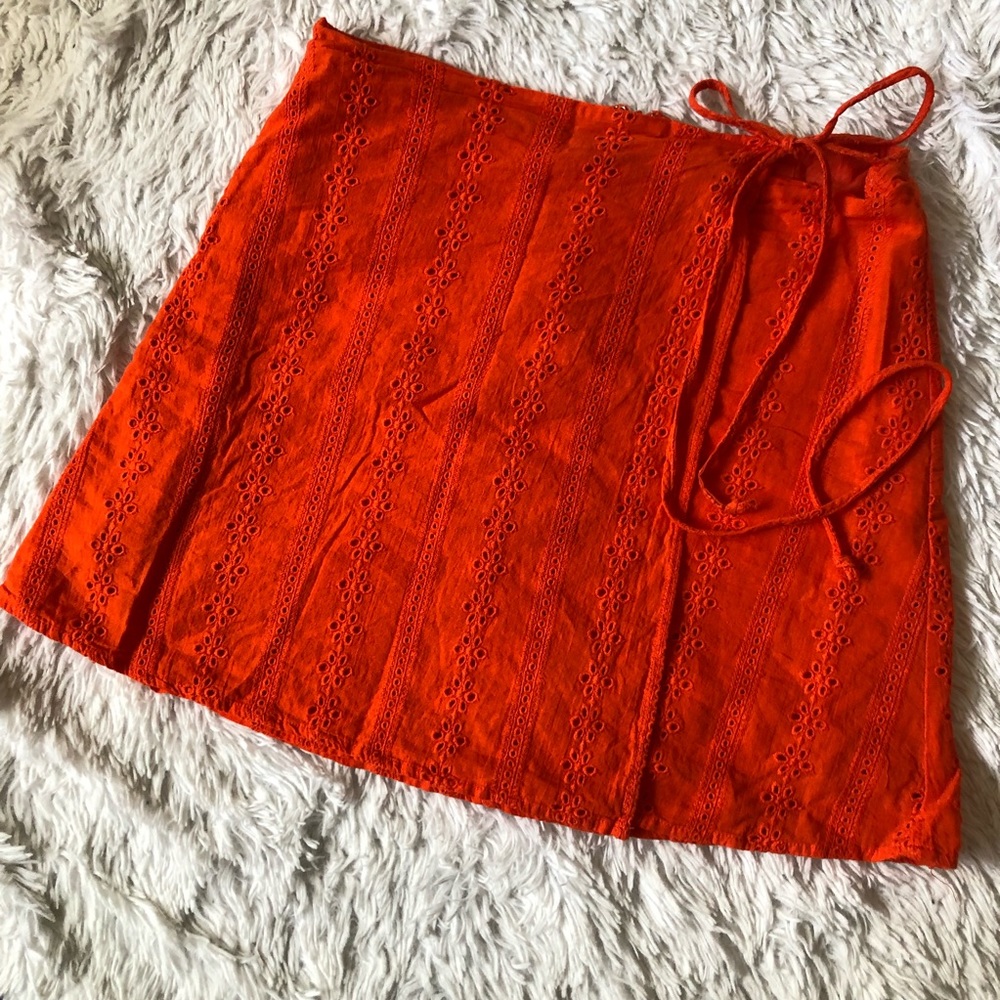 Orange eyelet wrap Aline mini skirt